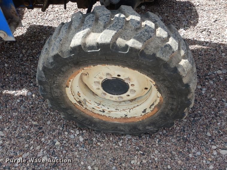 image for item HS9713 New Holland TC30  tractor