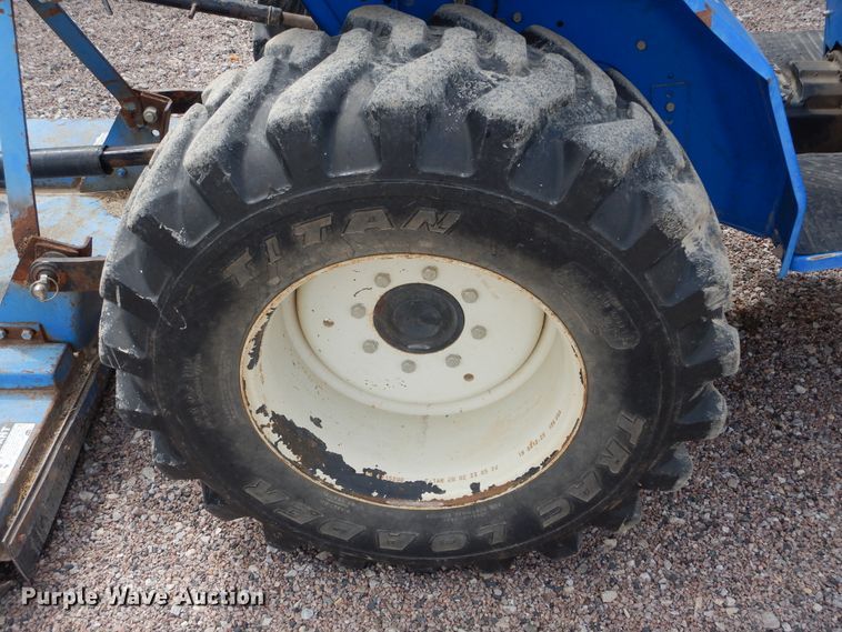 image for item HS9713 New Holland TC30  tractor