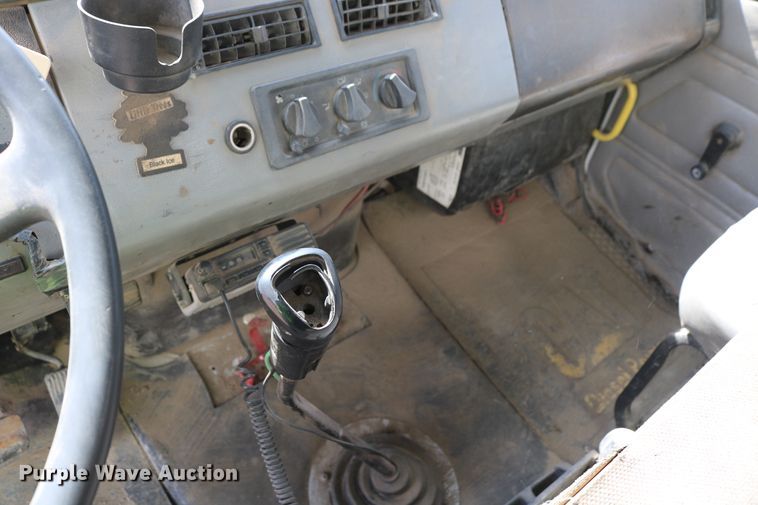 image for item DD6104 2001 Freightliner FL70  fuel and lube truck