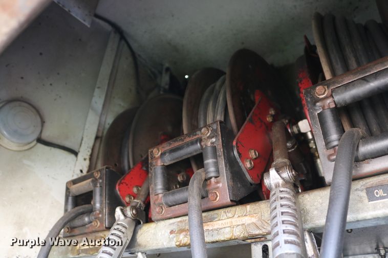 image for item DD6104 2001 Freightliner FL70  fuel and lube truck