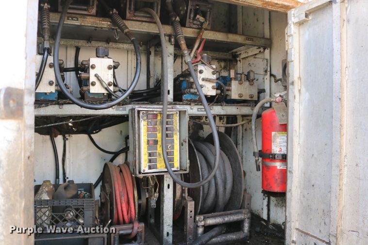 image for item DD6104 2001 Freightliner FL70  fuel and lube truck