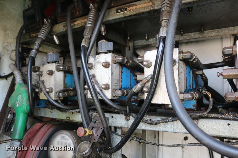 image for item DD6104 2001 Freightliner FL70  fuel and lube truck