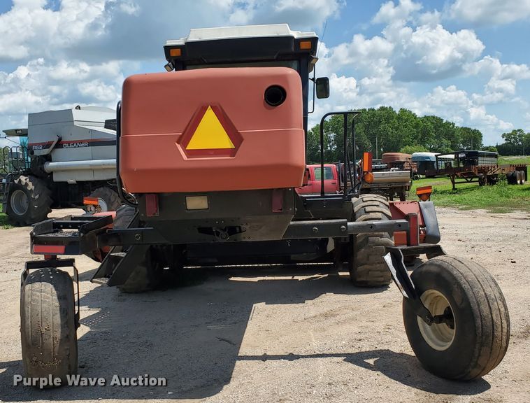 image for item DJ3163 2002 Hesston 8450  windrower