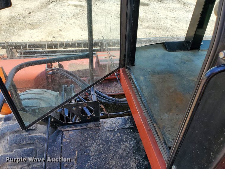 image for item DJ3163 2002 Hesston 8450  windrower