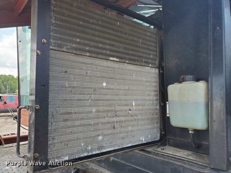 image for item DJ3163 2002 Hesston 8450  windrower