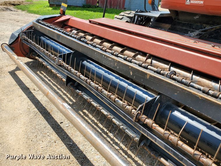image for item DJ3163 2002 Hesston 8450  windrower
