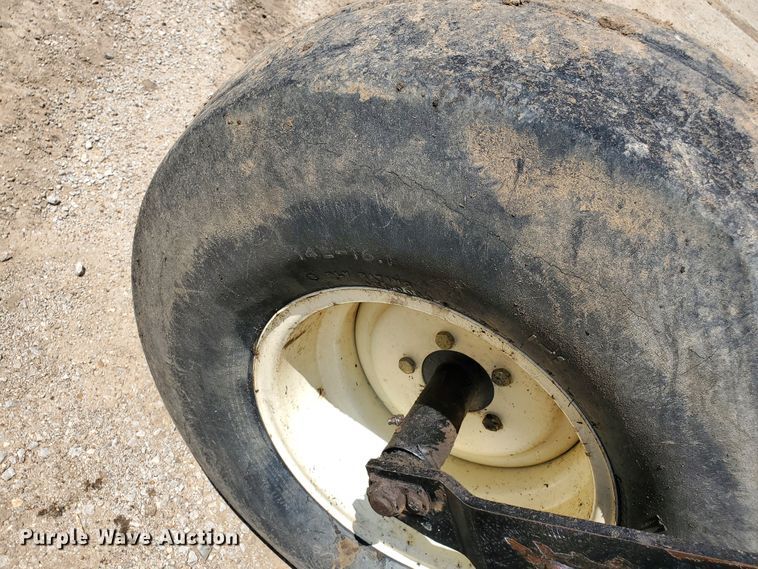 image for item DJ3163 2002 Hesston 8450  windrower