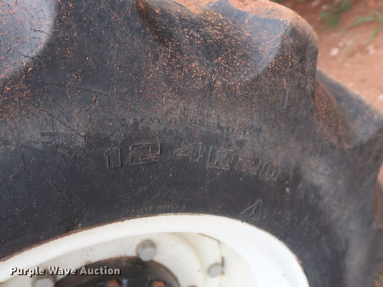 image for item HT9604 2005 New Holland TN60A  MFWD tractor