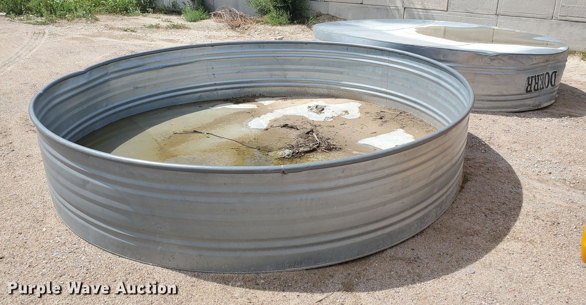 (2) Doerr livestock tanks in Garden City, KS Item GM9275 sold