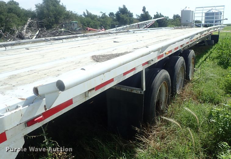 image for item DG2396 1990 Aztec CT flatbed hay trailer