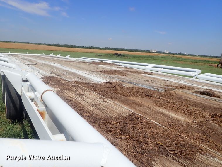 image for item DG2397 1974 Wilson GH-400 flatbed hay trailer