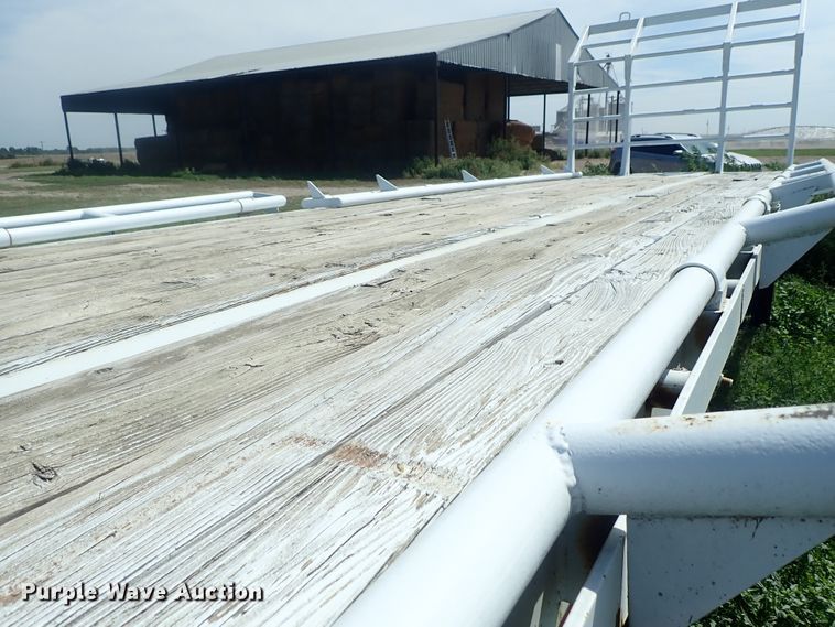 image for item DG2397 1974 Wilson GH-400 flatbed hay trailer