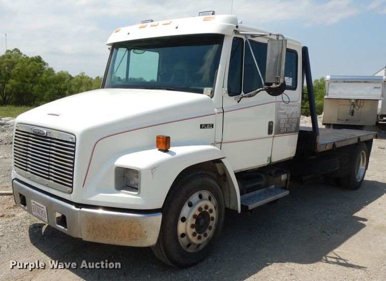 image for item DG7986 1999 Freightliner FL60  flatbed truck