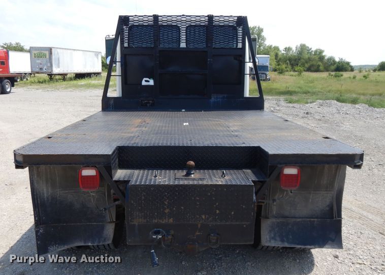 image for item DG7986 1999 Freightliner FL60  flatbed truck