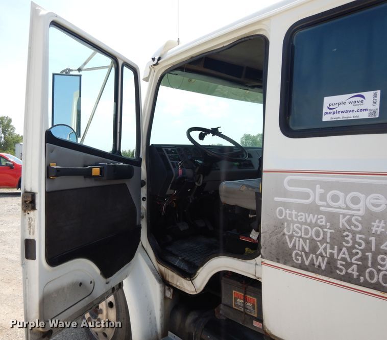 image for item DG7986 1999 Freightliner FL60  flatbed truck