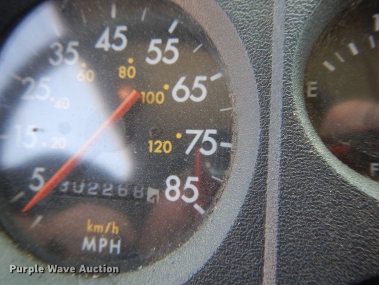 image for item DG7986 1999 Freightliner FL60  flatbed truck