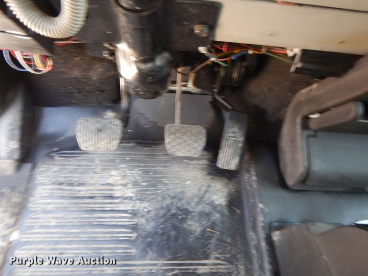 image for item DG7986 1999 Freightliner FL60  flatbed truck