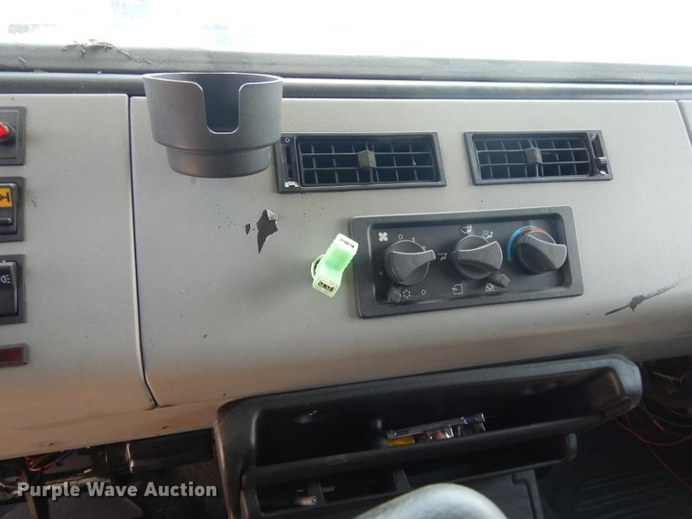 image for item DG7986 1999 Freightliner FL60  flatbed truck