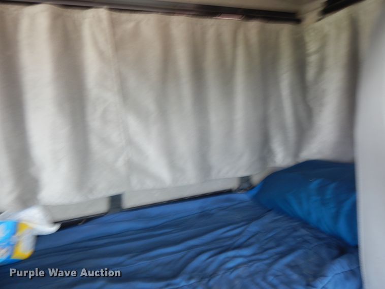 image for item DG7986 1999 Freightliner FL60  flatbed truck