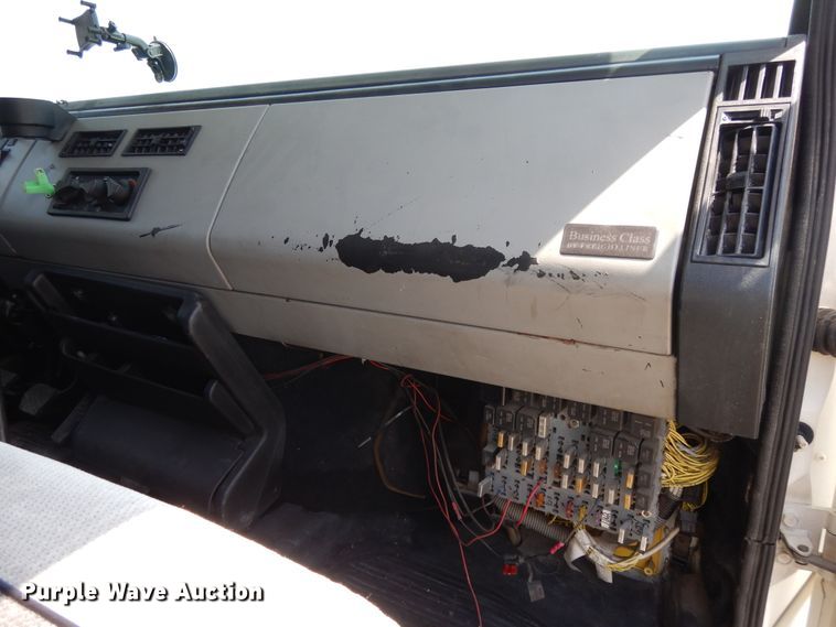 image for item DG7986 1999 Freightliner FL60  flatbed truck