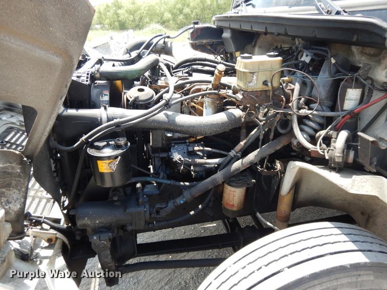 image for item DG7986 1999 Freightliner FL60  flatbed truck