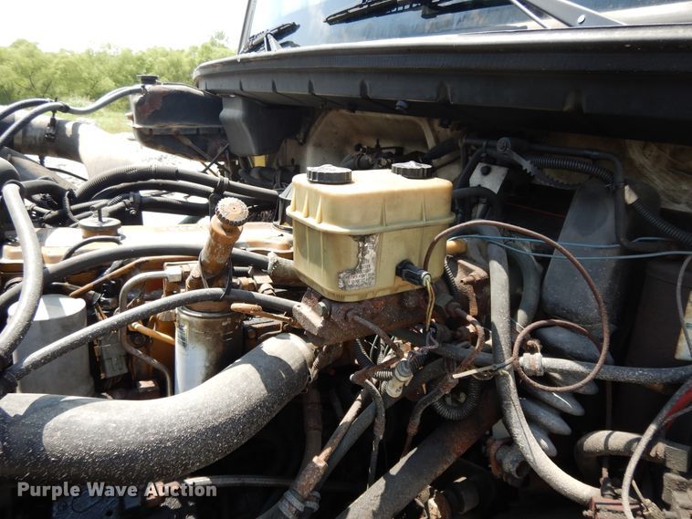 image for item DG7986 1999 Freightliner FL60  flatbed truck