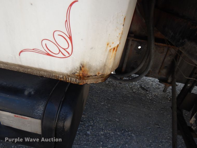 image for item DG7986 1999 Freightliner FL60  flatbed truck