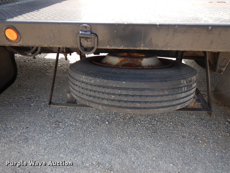 image for item DG7986 1999 Freightliner FL60  flatbed truck