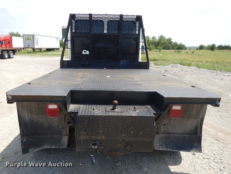 image for item DG7986 1999 Freightliner FL60  flatbed truck
