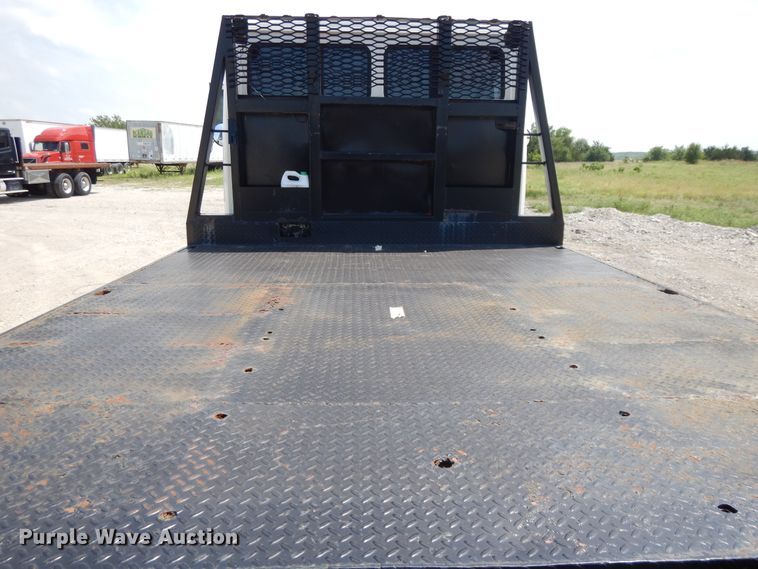 image for item DG7986 1999 Freightliner FL60  flatbed truck