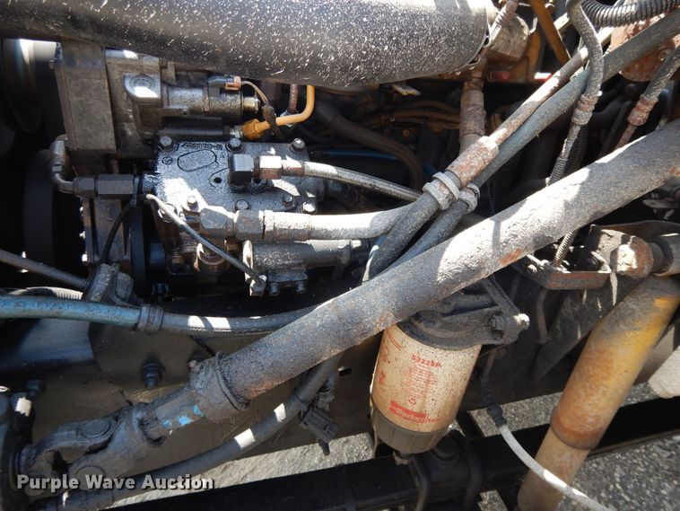 image for item DG7986 1999 Freightliner FL60  flatbed truck