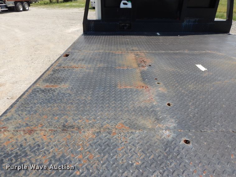 image for item DG7986 1999 Freightliner FL60  flatbed truck