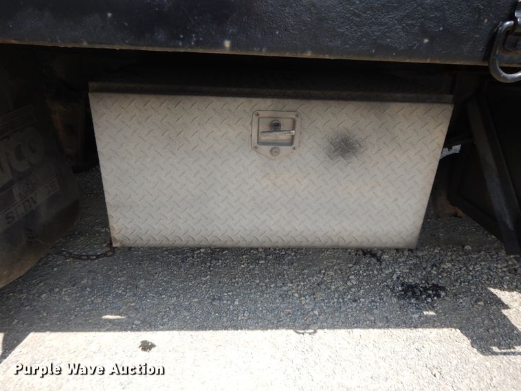 image for item DG7986 1999 Freightliner FL60  flatbed truck