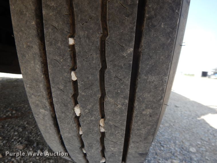 image for item DG7986 1999 Freightliner FL60  flatbed truck