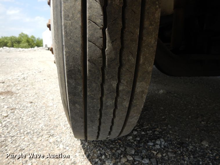 image for item DG7986 1999 Freightliner FL60  flatbed truck