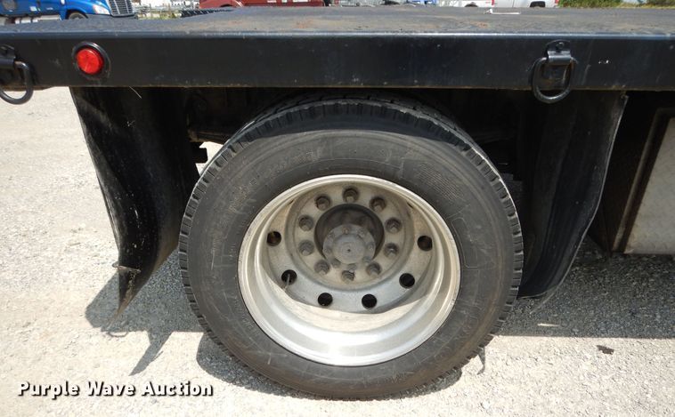 image for item DG7986 1999 Freightliner FL60  flatbed truck