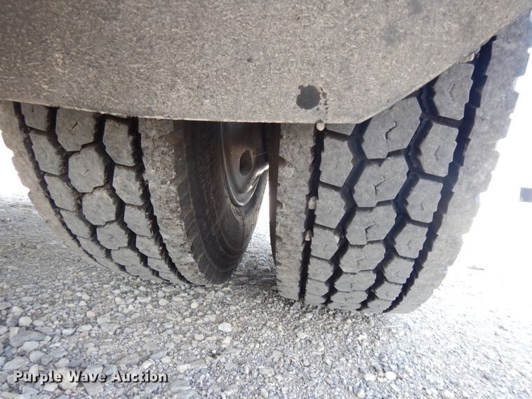 image for item DG7986 1999 Freightliner FL60  flatbed truck