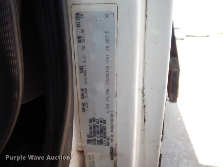 image for item DG7986 1999 Freightliner FL60  flatbed truck