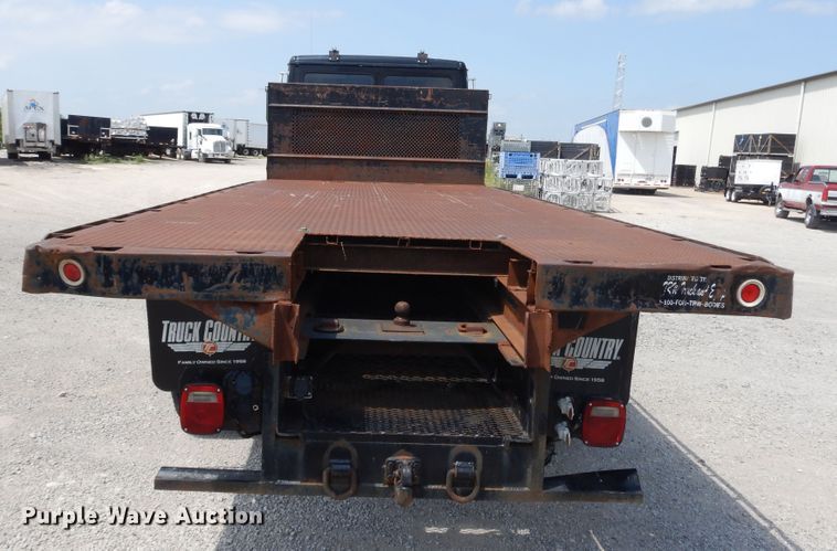 image for item DG7987 2001 Freightliner FL112  flatbed truck