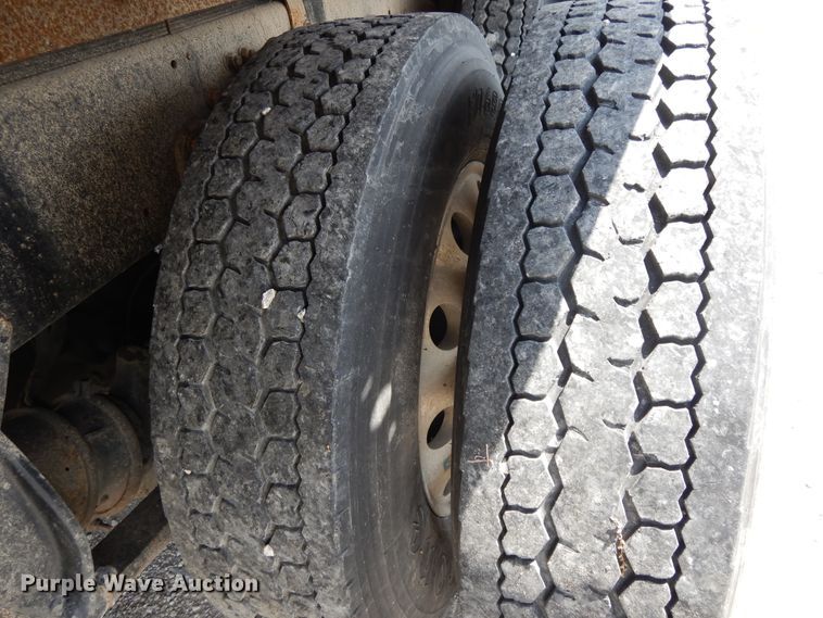 image for item DG7987 2001 Freightliner FL112  flatbed truck