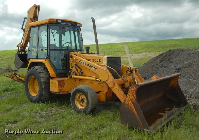 image for item DJ4316 1992 John Deere 300D  backhoe