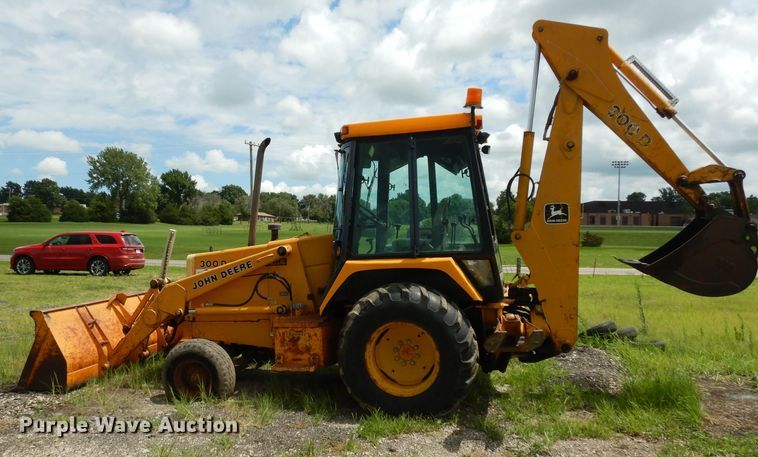 image for item DJ4316 1992 John Deere 300D  backhoe