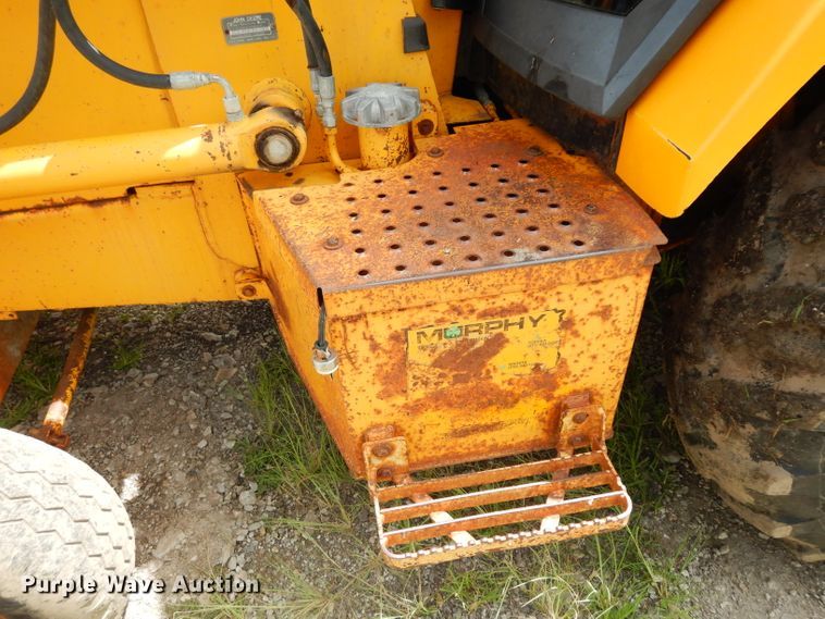image for item DJ4316 1992 John Deere 300D  backhoe