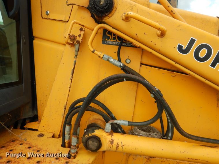 image for item DJ4316 1992 John Deere 300D  backhoe