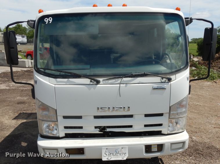 image for item DJ3474 2011 Isuzu NPR  flatbed truck