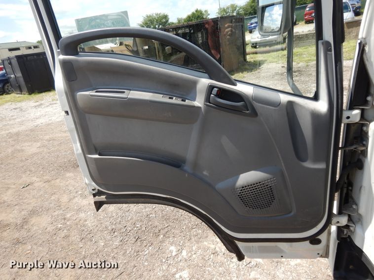 image for item DJ3474 2011 Isuzu NPR  flatbed truck