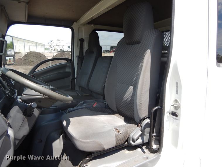 image for item DJ3474 2011 Isuzu NPR  flatbed truck