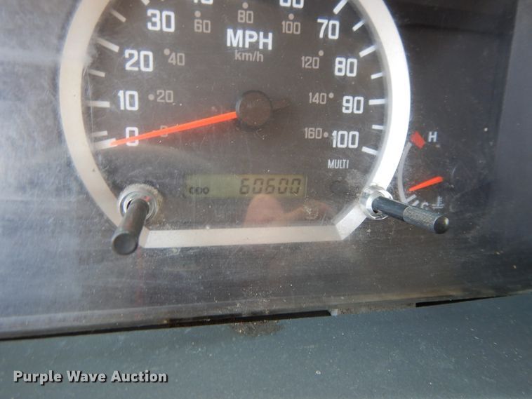 image for item DJ3474 2011 Isuzu NPR  flatbed truck