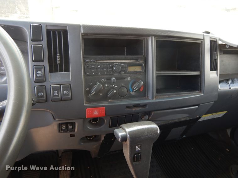 image for item DJ3474 2011 Isuzu NPR  flatbed truck