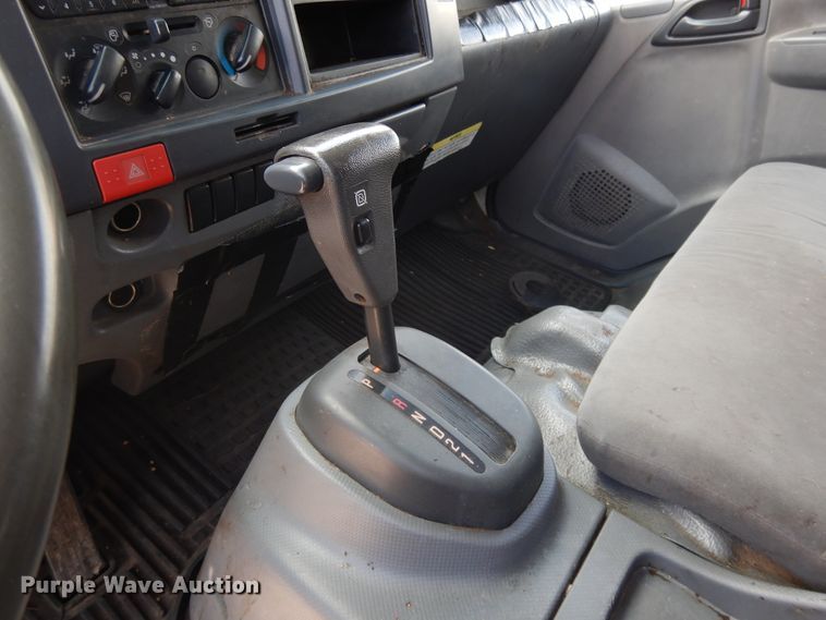 image for item DJ3474 2011 Isuzu NPR  flatbed truck